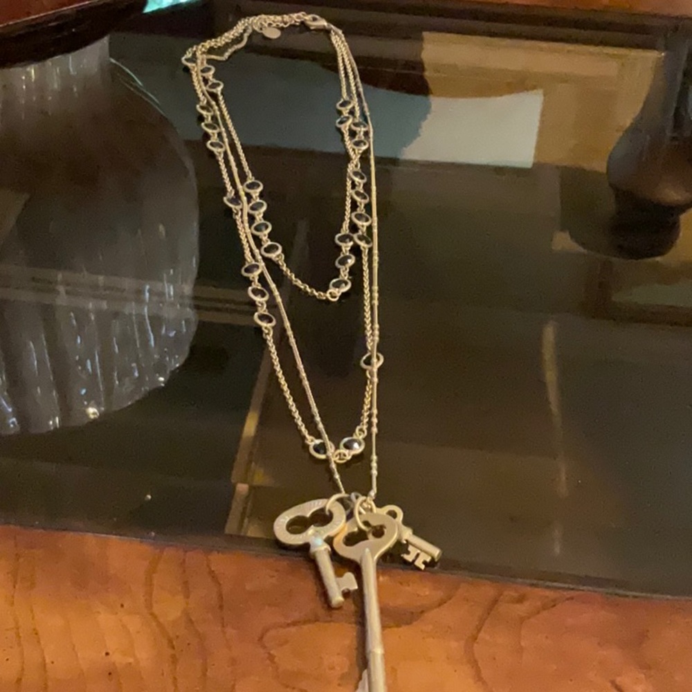 Fabulous necklace!  Matte Gold with black stones and 3 keys on longest chain.